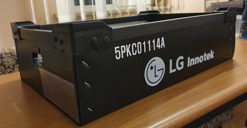 Three blue corrugated plastic boxes with different internal divider layouts.