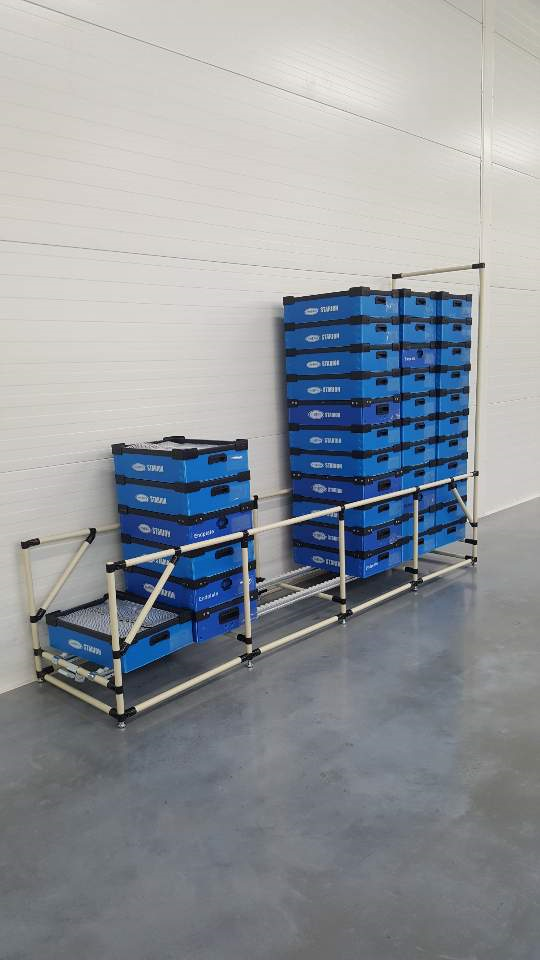 Blue corrugated plastic box with a grey fabric grid divider and padded top edges.